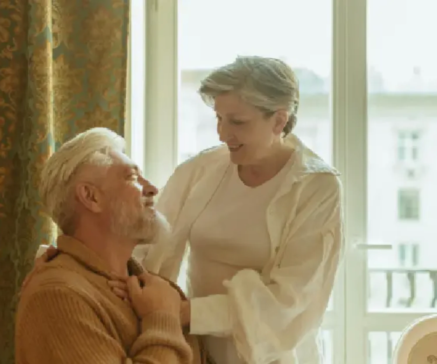 Elderly family carer with patient