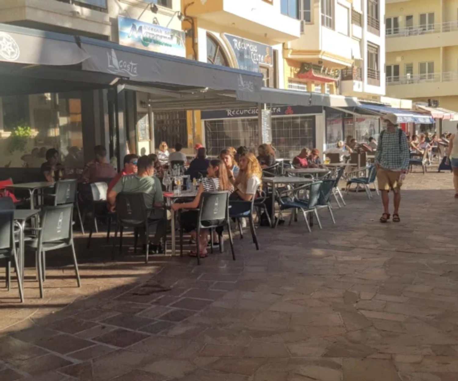 Traditional Tenerife barraquito coffee served at a sunny outdoor café